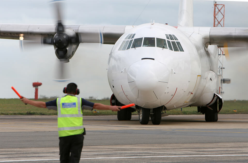 turbo prop plane taking off