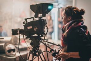 Film production professionals preparing for a video shoot