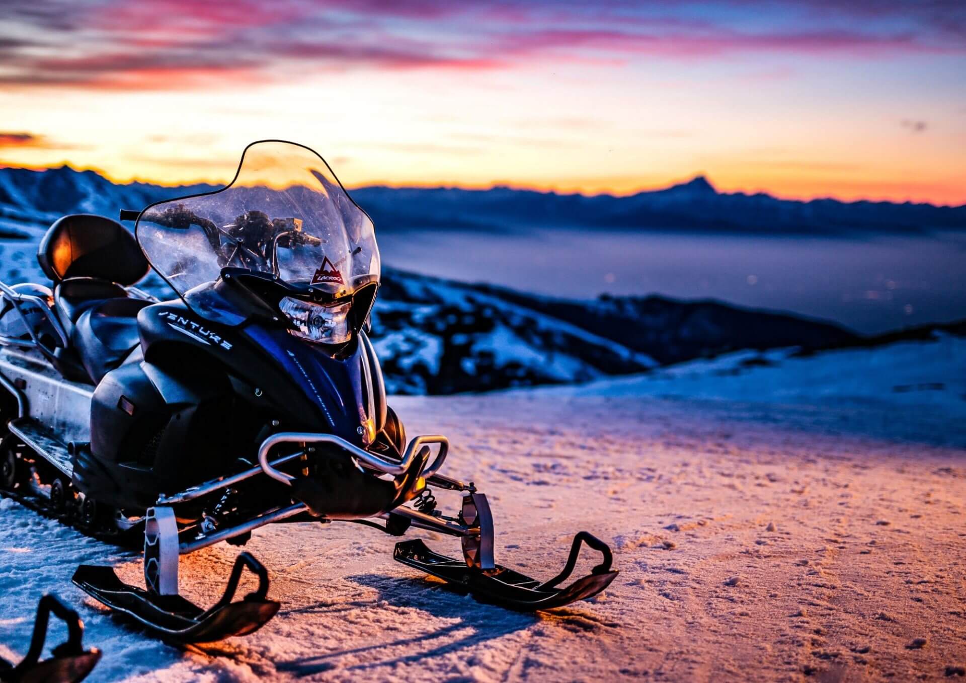 Snowmobile sunset