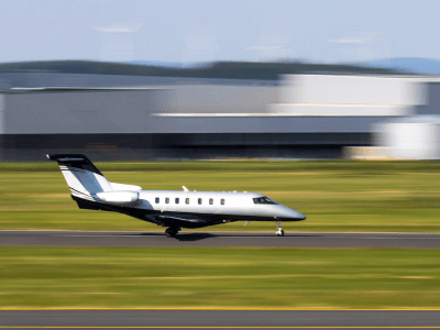 Private Jet Landing on Runway