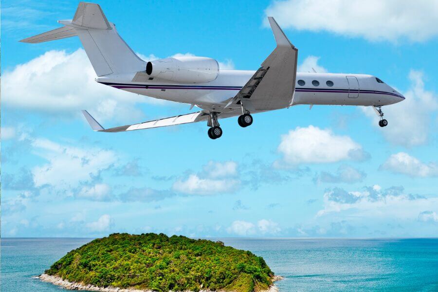 Private Jet flying over island